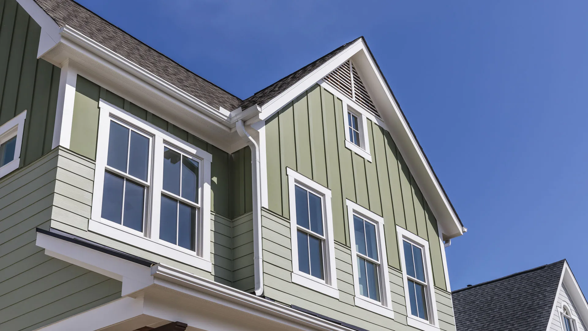 Installed windows on the finished exterior of a townhouse